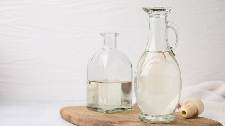 clear jugs of vinegar