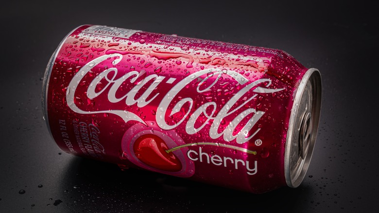 a can of Cherry Coca-Cola is turned on its side