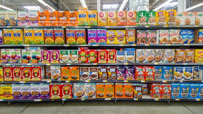 Cereal boxes line the shelves at a grocery store