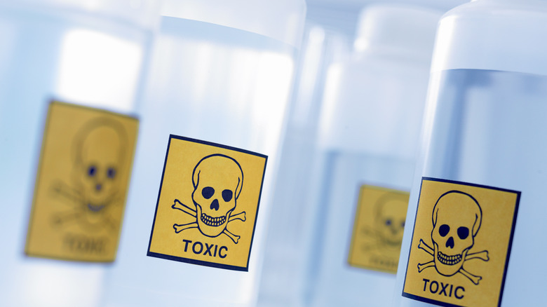 Clear plastic tubes labeled "toxic"