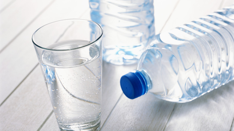 Bottles of water on wood