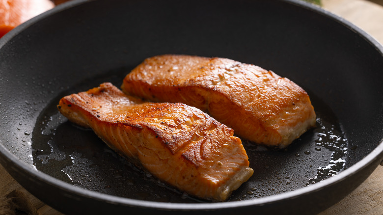 Fish fillets in frying pan