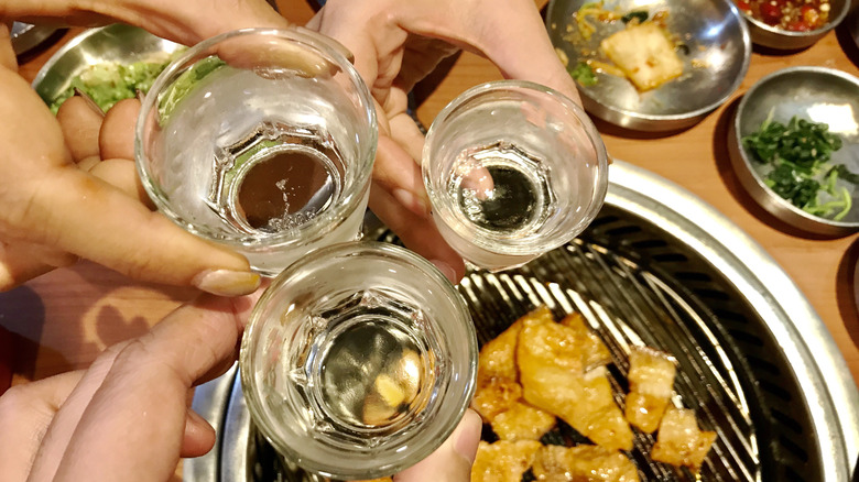 Soju shots over Korean barbecue