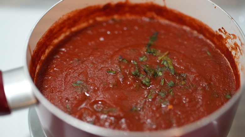 Simmering tomato sauce in a pot