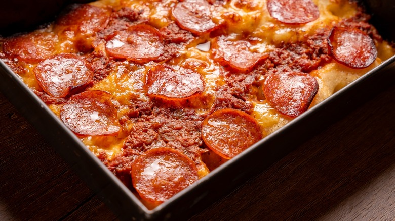 Detroit-style pizza in the pan