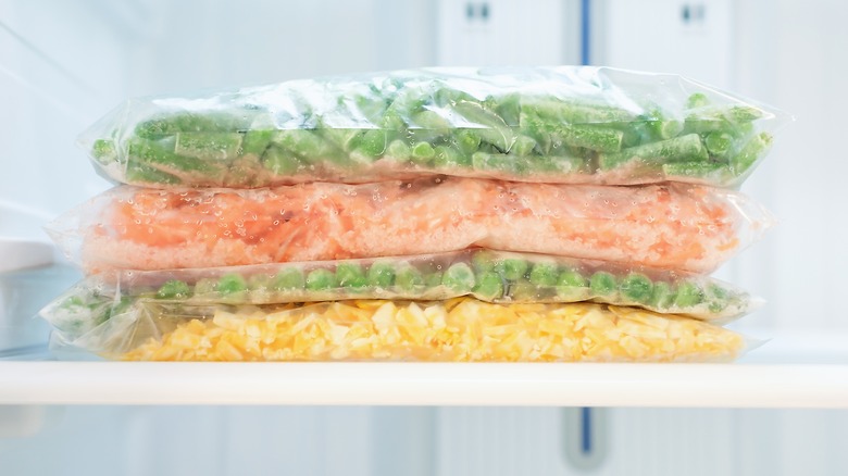 Frozen vegetables stacked in plastic bags