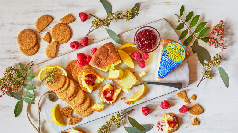 cheese and cracker board with lemon ricotta and jam