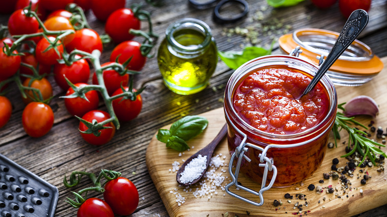 Jar of sauce with tomatoes