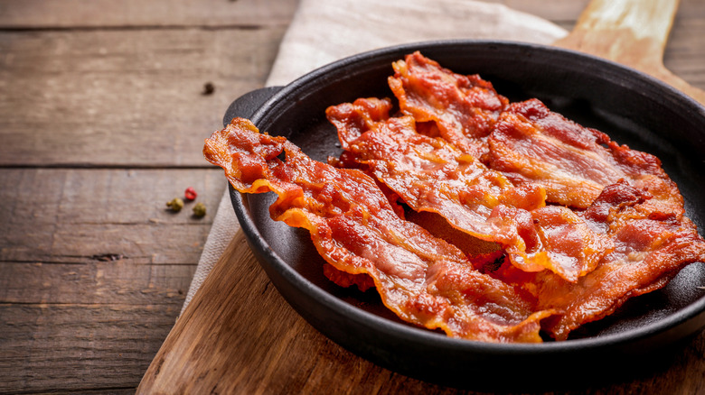 Crispy bacon in a cast iron pan