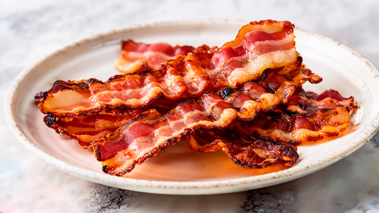 Plate with pile of bacon