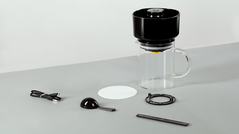 VacOne Air Brewer with accessories on gray background.