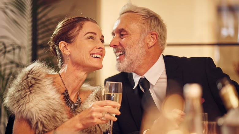 Dressed up couple with Champagne