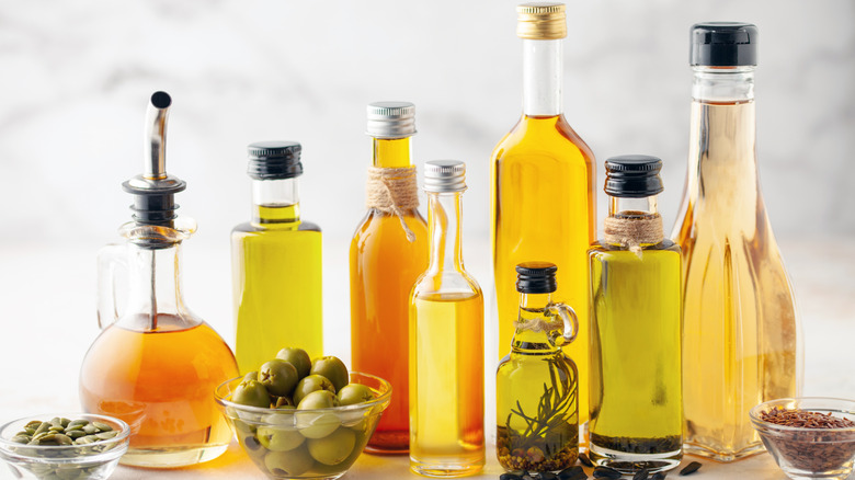 various bottles of oil on table