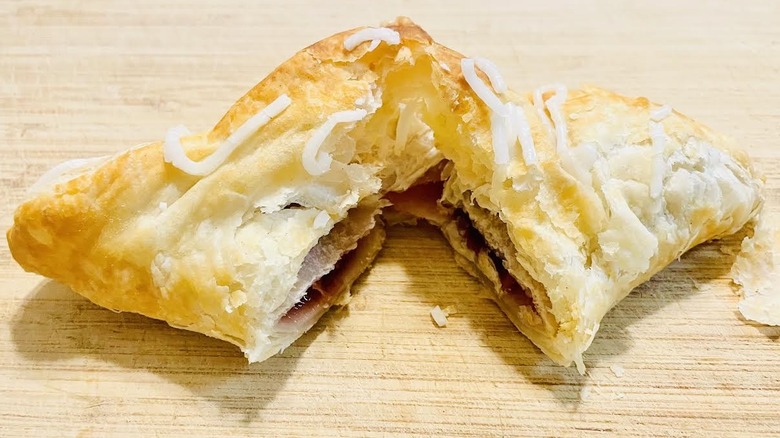 Arby's Cherry Turnover cut in half with filling showing