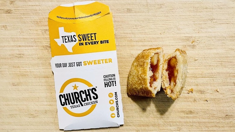 Church's Texas Chicken Apple Pie with paper sleeve