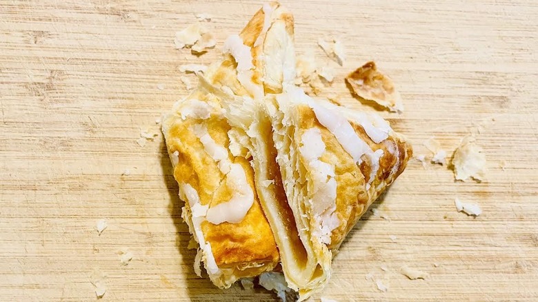 Arby's Apple Turnover cut in half with filling showing