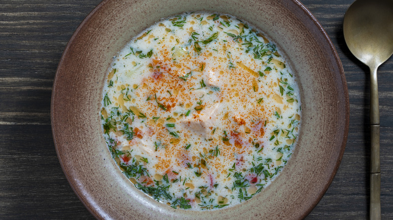 A close up bowl of fish soup