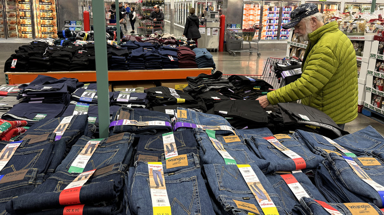 Customer shopping for jeans in Costco