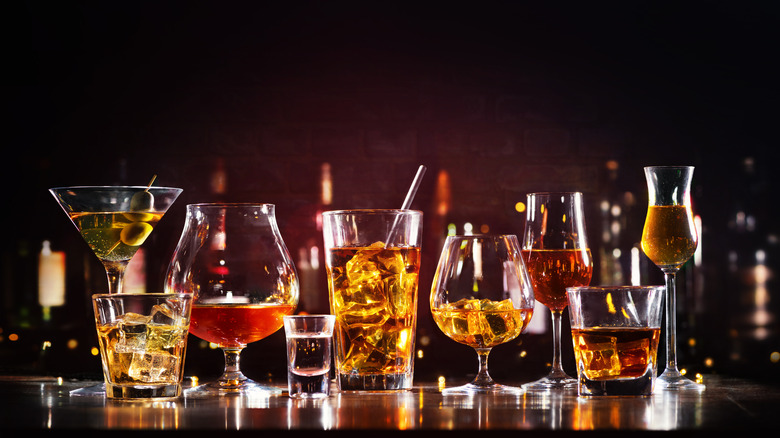 several cocktails on a bar