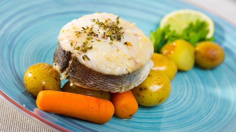 Cooked pollock with vegetables