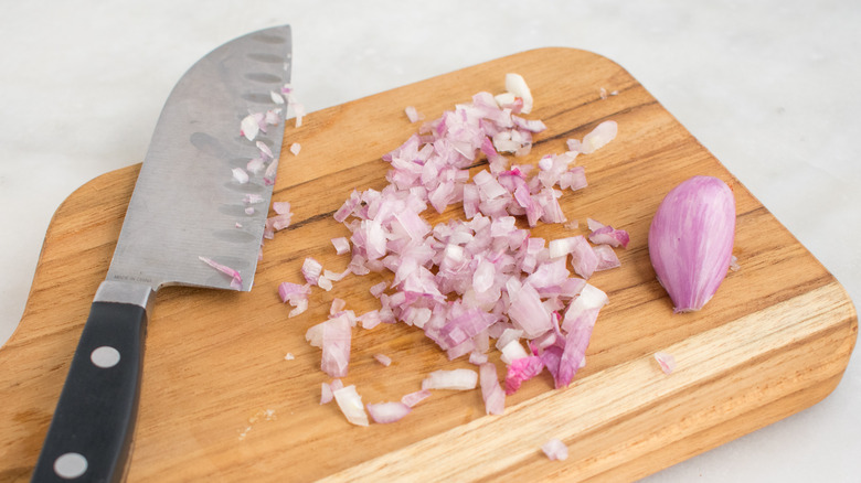 Knife with minced shallots
