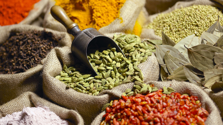 Open sacks of colorful spices