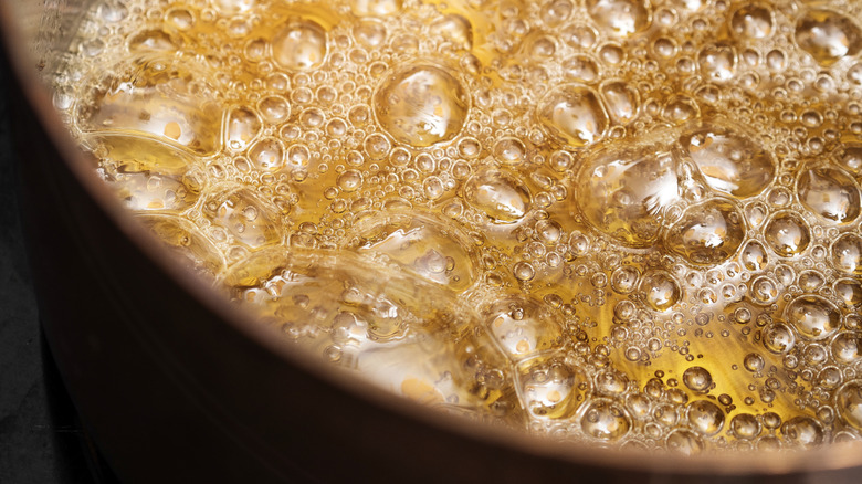 Close-up of caramel bubbling
