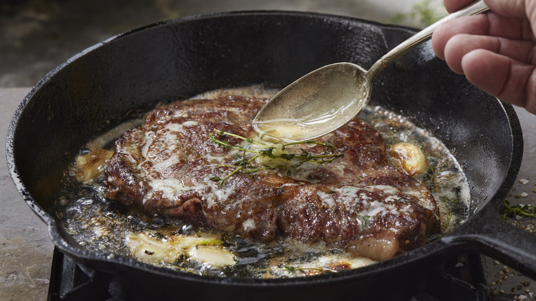 searing steak in pan