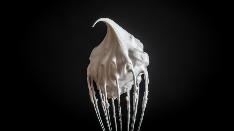whisk with whipped cream