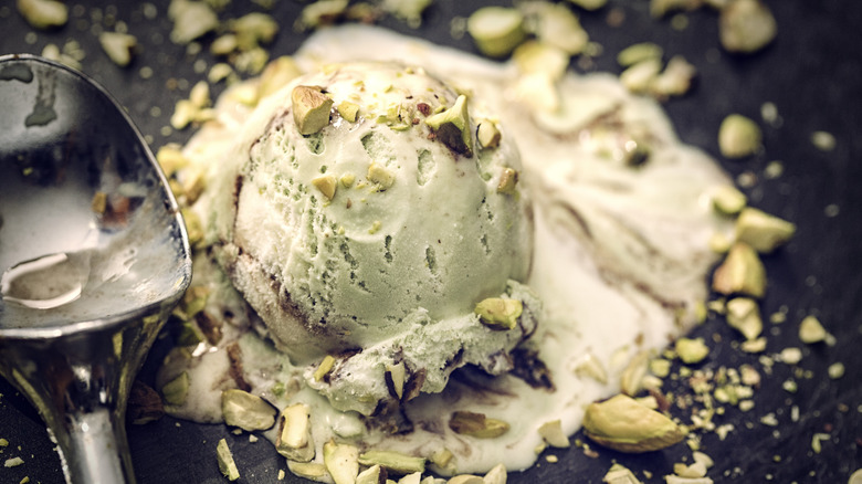 Pistachio ice cream with scoop