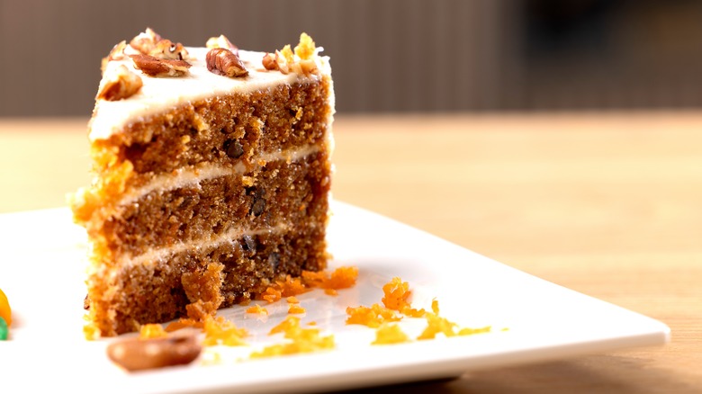 slice of carrot cake on white plate