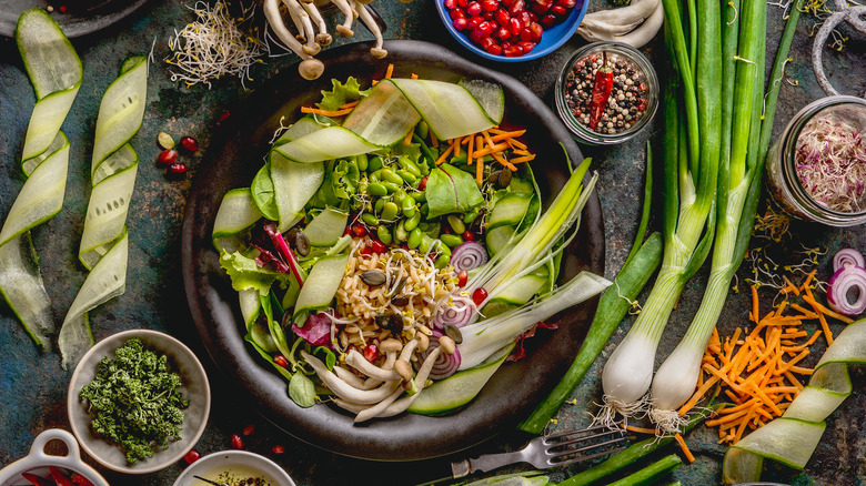 vegetable salad surrounded by ingredients