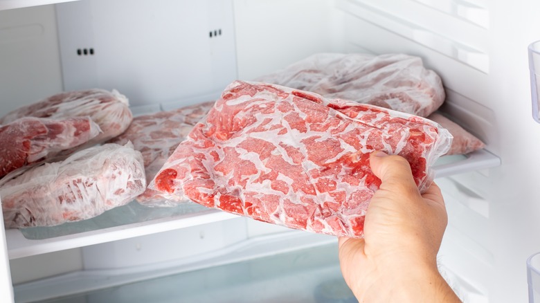 Taking frozen beef from freezer