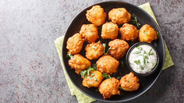 Hush puppies with herbs and dipping sauce