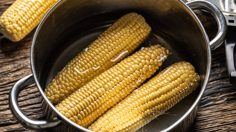 Corn in pot of water