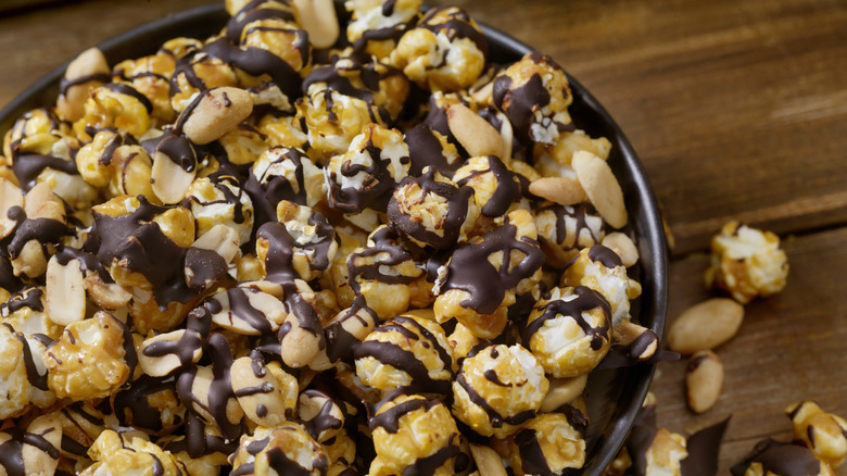 Dark chocolate drizzled over popcorn