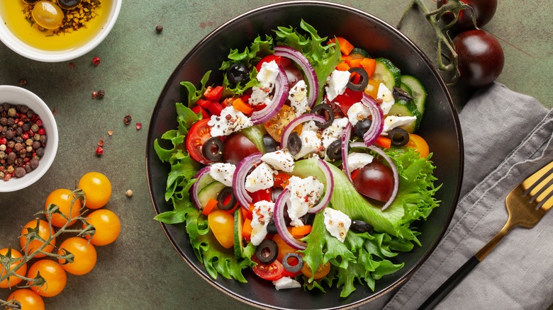 Classic Greek salad in black bowl