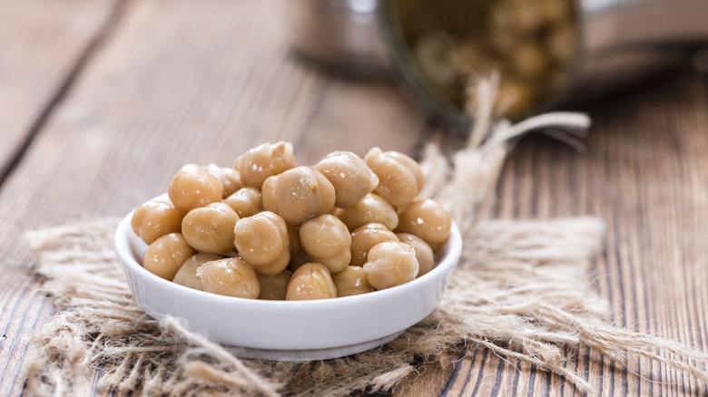 Portion of chickpeas on small white plate