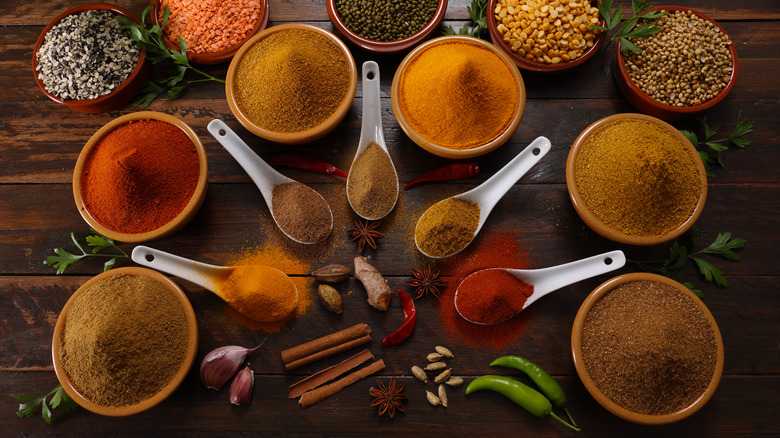 bowls and spoons of spices 