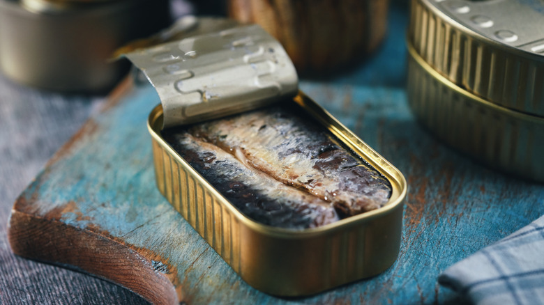 Partially opened can of sardines