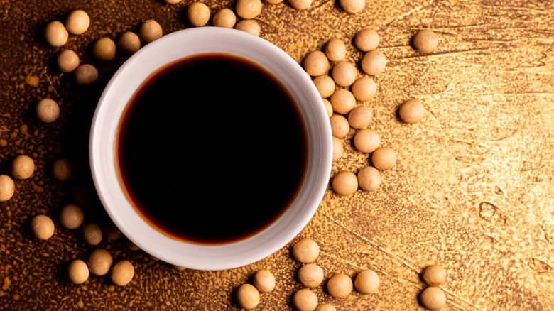 Bowl of soy sauce with soybeans