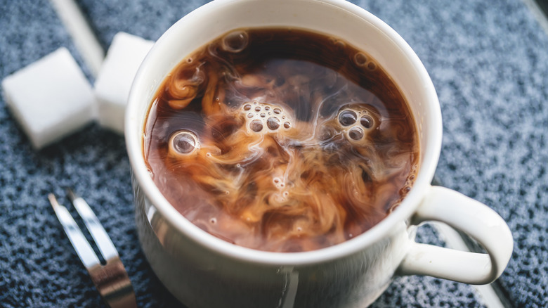 creamer in coffee cup