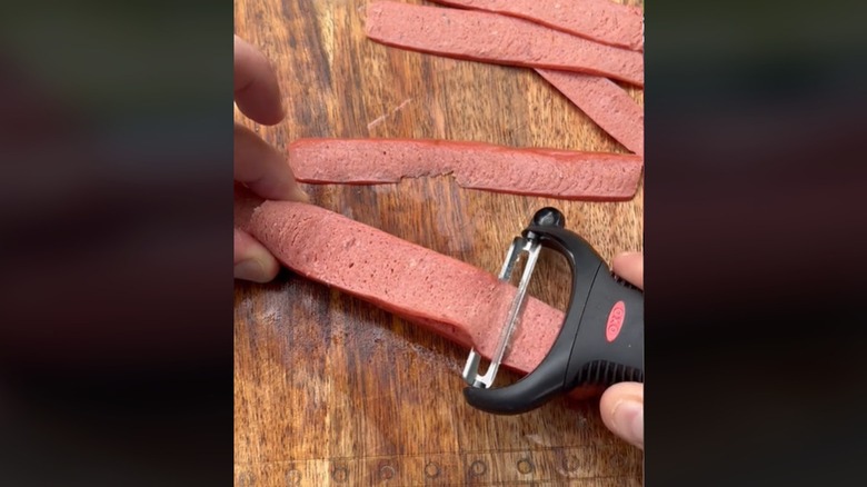 Vegetable peeler shaving hot dog