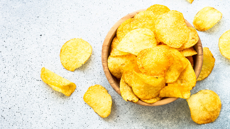 potato chips on marble background