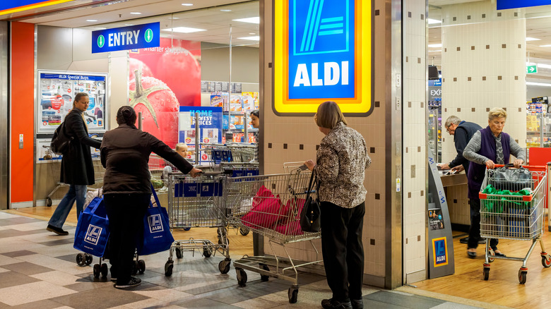 Aldi shoppers at store entrance