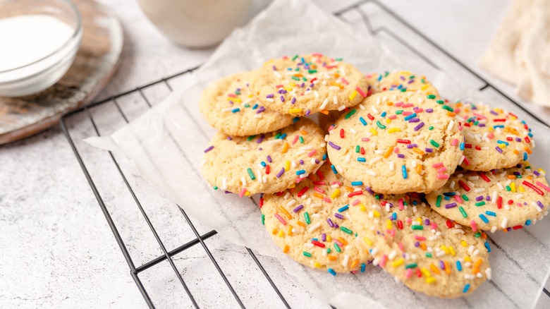 Rainbow sprinkle cookies on rack