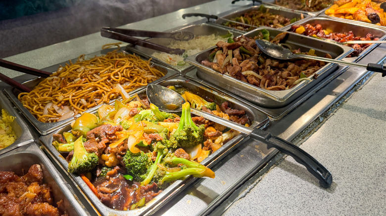 Trays with vegetables or meat dishes