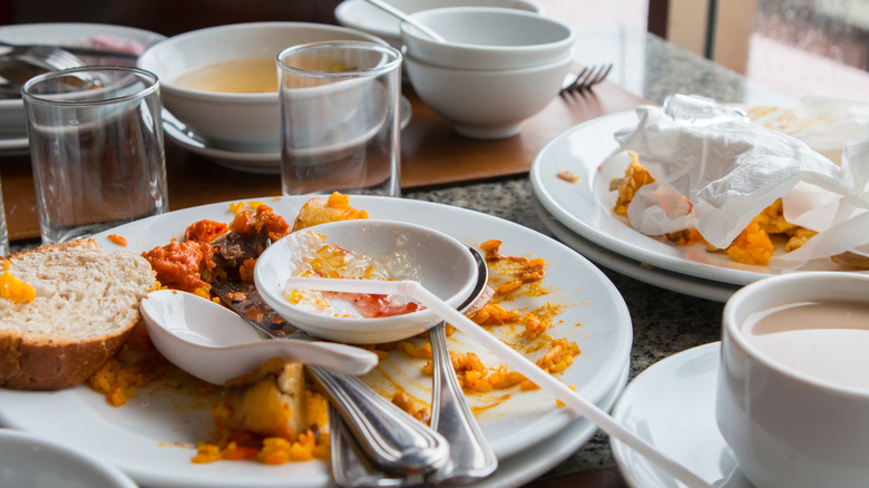 Dirty dishes on restaurant table