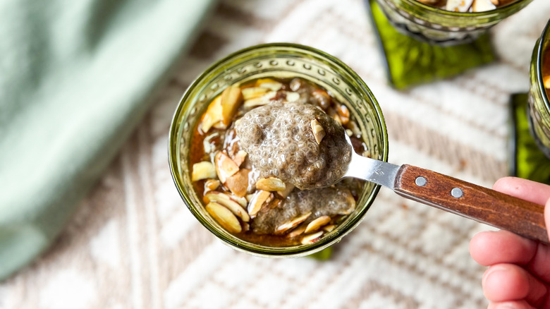 Close up of almond chai chia pudding on spoon