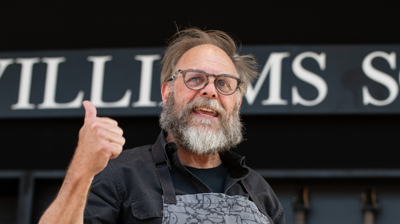 Alton Brown talking and giving a thumbs up